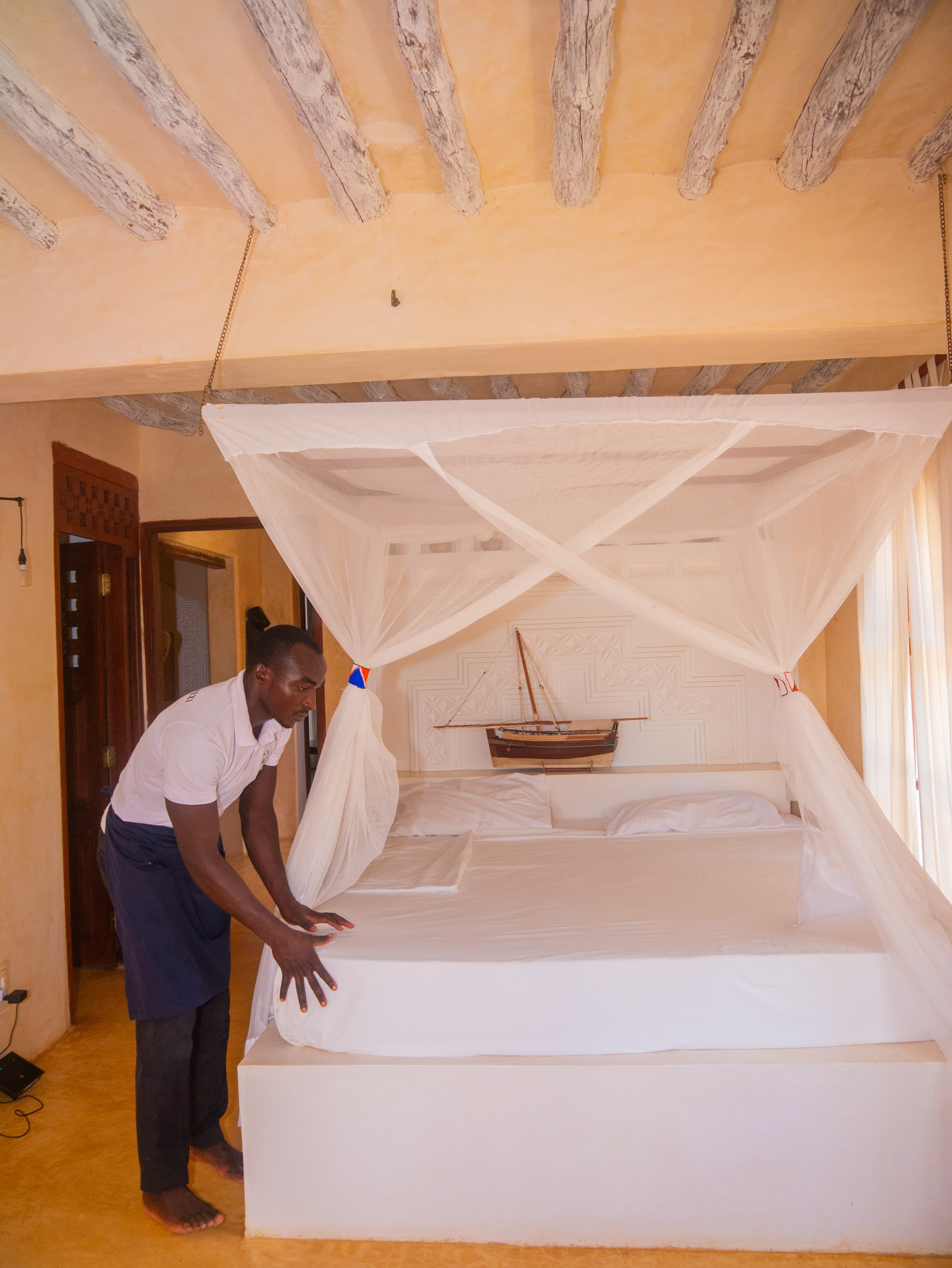 Staff making the bed with care