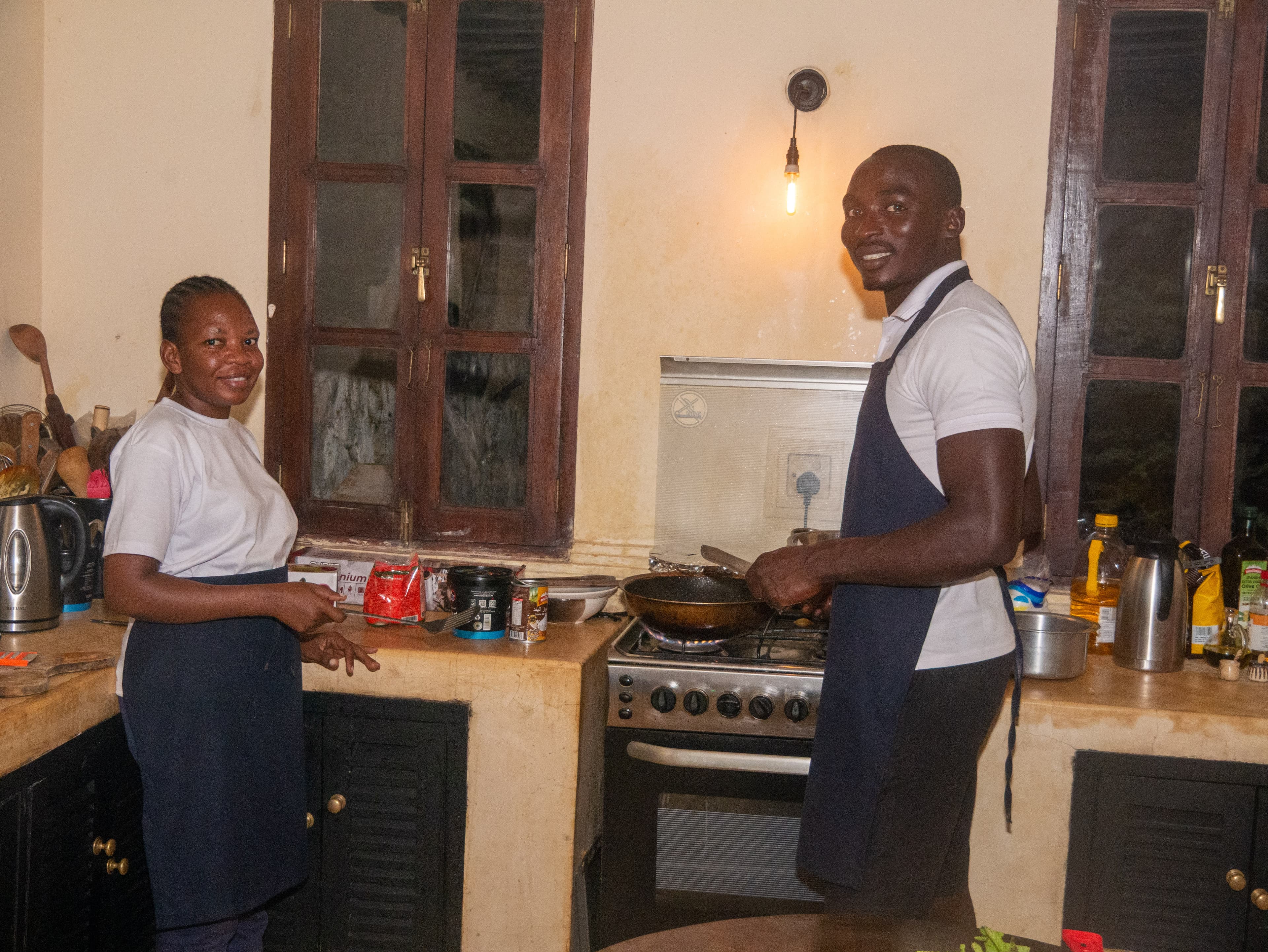 Friendly staff smiling in the kitchen