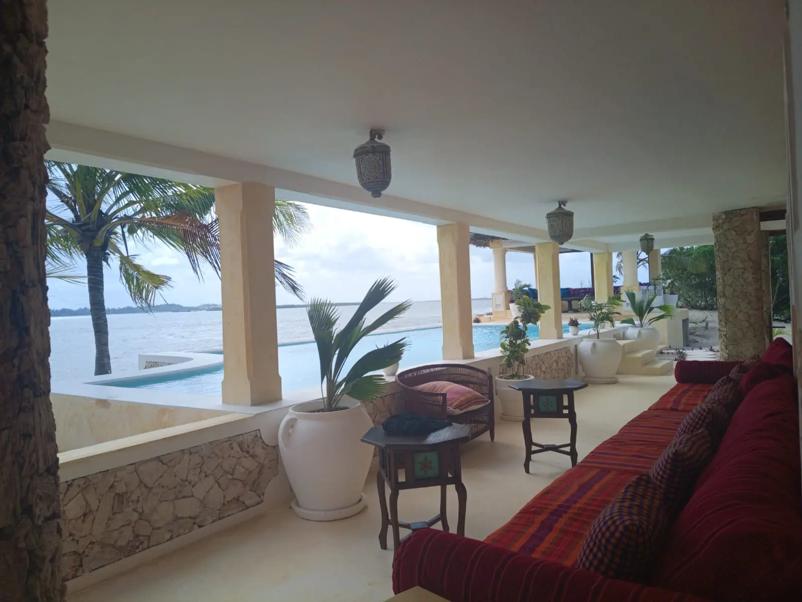 Ocean view living area with pool view and traditional furnishings